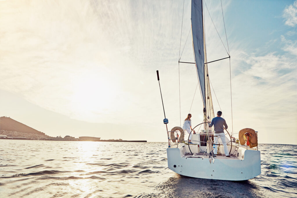 Business owner, empowered by successful Exit Planning, sailing into the sunset.